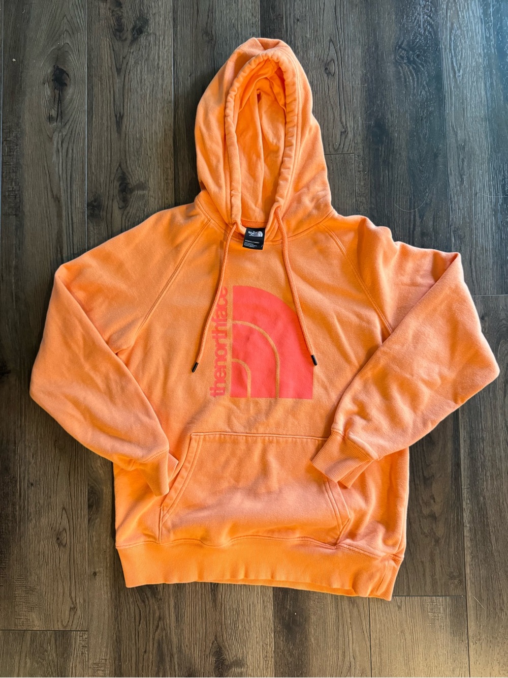 The North Face Woman’s peach/coral Logo Hoodie Sweatshirt